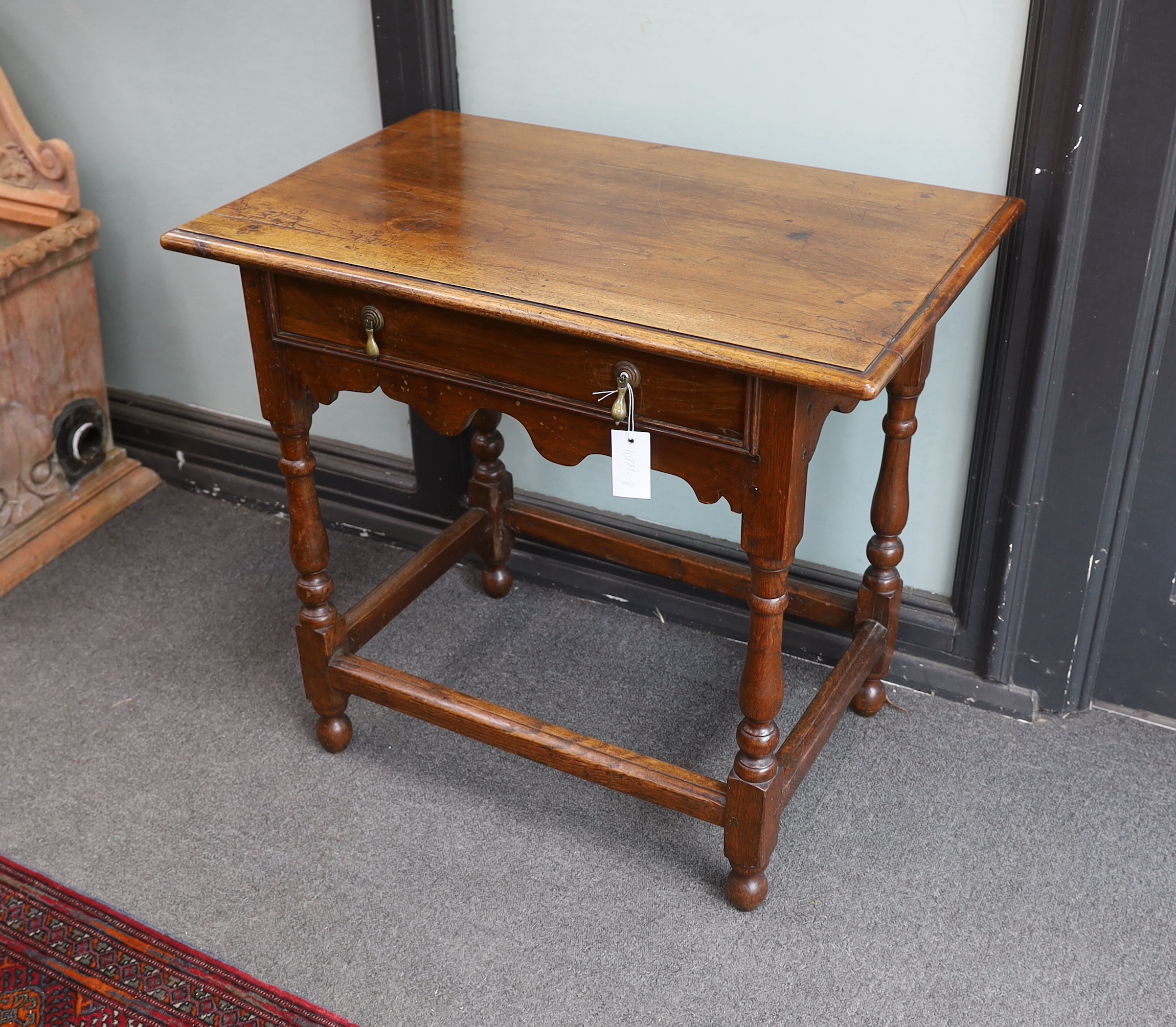 An 18th century and later rectangular walnut and oak side table, width 76cm, depth 49cm, height 69cm